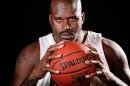 Miami Heat center Shaquille O'Neal poses for a photo on NBA basketball media day in Florida