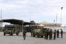 File photo of Tunisian soldiers stand guard at the border crossing at Ras Jdir Ben Guerdane, southeast of Tunis