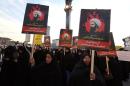 Iranian women gather during a demonstration against the execution of prominent Shiite Muslim cleric Nimr al-Nimr by Saudi authorities, at Imam Hossein Square in Tehran on January 4, 2016
