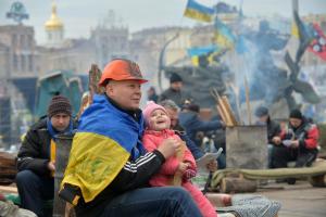 A protester holds his daughter, at the camp of the&nbsp;&hellip;