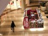 A woman walks through a shopping mall in San Francisco