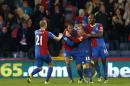 Crystal Palace's French-born Moroccan striker Marouane Chamakh (2nd L) celebrates after scoring the opening goal at the Selhurst Park in south London on December 3, 2013