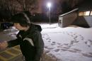 In this Thursday, Feb. 20, 2014 photo, Cody Lewis, 21, a recovering heroin addict, smokes a cigarette before speaking about his life and addiction at the Good Samaritan Methodist Church in Addison, Ill. When Lewis walked out of Cook County Jail in May 2013 after being arrested with 15 bags of heroin, he had $11 in his pocket. Almost immediately, he spent $10 on yet another bag of the drug. By then, Lewis was a $100-a-day addict. (AP Photo/Charles Rex Arbogast)