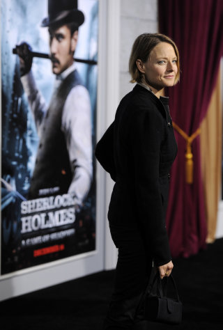 Jodie Foster poses at the premiere of the film "Sherlock Holmes: A Game of Shadows" in Los Angeles, Tuesday, Dec. 6, 2011. The film is released in theaters on Friday, December 16. (AP Photo/Chris Pizzello)