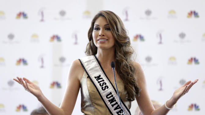 CORRECTS CROWNING DATE TO JAN 25 - FILE - In this Oct. 2, 2014 file photo, Miss Universe, Gabriela Isler, of Venezuela, speaks during a news conference in Doral, Fla. Isler's reign is in its final days, with the next woman to wear the crown to be selected Jan. 25 in Miami. The classic tiara _ the one that slipped off her head on the night she was crowned _ soon will be gently placed atop someone else and after touring the world almost nonstop, Isler is ready to see what the next chapter brings. (AP Photo/Wilfredo Lee, File)