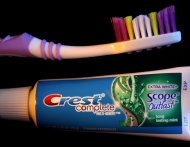 <p>               This Jan. 23, 2012 photo, shows a travel-size tube of Crest toothpaste and toothbrush in a Moreland Hills, Ohio home. Procter & Gamble Co. said Friday Jan. 27, 2012 its net income fell 49 percent in the fiscal second quarter, hobbled by higher materials costs and a writedown in the value of some of its businesses. P&G also lowered its earnings predictions for the year. (AP Photo/Amy Sancetta)