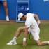 Murray of Britain reacts during his men's singles tennis match agianst Mahut of France at the Queen's Club tournament in London