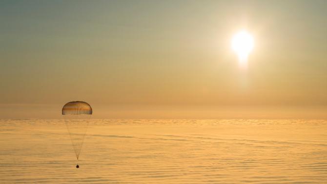 The Soyuz TMA-14M spacecraft is seen as it lands with Expedition 42 commander Barry Wilmore of NASA, Alexander Samokutyaev of the Russian Federal Space Agency (Roscosmos) and Elena Serova of Roscosmos near the town of Zhezkazgan, Kazakhstan