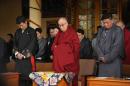 Tibetan spiritual leader the Dalai Lama (C) observes a minute of silence to mourn the death of Tibetans due to Chinese crackdowns in Tibet, in McLeod Ganj, Dharamshala, on March 10, 2012