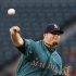 Seattle Mariners starting pitcher Blake Beavan throws to the Los Angeles Angels in the third inning of a baseball game Monday, Aug. 29, 2011, in Seattle. (AP Photo/Elaine Thompson)