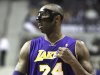 Los Angeles Lakers guard Kobe Bryant (24) walks up the court during the first quarter of an NBA basketball game against the Detroit Pistons in Auburn Hills, Mich., Tuesday, March 6, 2012. (AP Photo/Carlos Osorio)