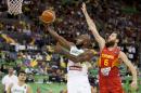 Brazil's Larry Taylor, left, shoots over Spain's Sergio Rodriguez during the Group A Basketball World Cup match between Brazil and Spain in Granada, Spain, Monday Sept. 1, 2014. The 2014 Basketball World Cup competition will take place in various cities in Spain from Aug. 30 through to Sept. 14. (AP Photo/Daniel Tejedor)