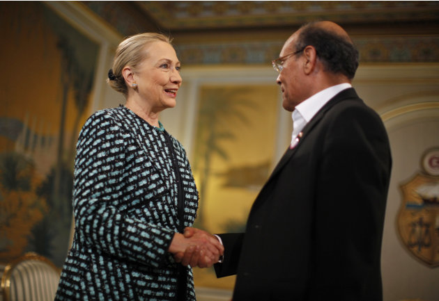 U.S. Secretary of State Hillary Rodham Clinton, left, meets with Tunisia's President Moncef Marzouk  at the Presidential Palace in Carthage, Tunisia, Saturday Feb. 25, 2012. (AP Photo/Jason Reed, Pool