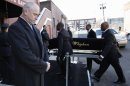 A coffin holding the remains of singer Whitney Houston is carried into the New Hope Baptist Church before her funeral services in Newark, N.J. on Saturday, Feb. 18, 2012. (AP Photo/Jason DeCrow)