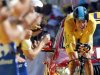 Team Sky rider and leader's yellow jersey Wiggins of Britain crosses the finish line during the individual time trial in the ninth stage of the 99th Tour de France cycling race between Arc et Senans and Besancon