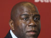 FILE - In this July 21, 2011, file photo, Hall of Fame basketball player turned businessman Earvin "Magic" Johnson appears during a news conference in Detroit. Los Angeles Dodgers owner Frank McCourt has announced an agreement Tuesday night, March 27, 2012, to sell the bankrupt team for $2 billion to a group that includes Johnson and former Atlanta Braves and Washington Nationals President Stan Kasten. (AP Photo/Carlos Osorio, File)