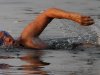 American endurance swimmer Diana Nyad swims in Cuban waters, offshore Havana, Cuba, Sunday, Aug. 7, 2011. Nyad jumped into Cuban waters Sunday evening and set off in a bid to become the first person to swim across the Florida Straits without the aid of a shark cage. (AP Photo/Franklin Reyes)
