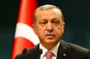 Turkish President Tayyip Erdogan speaks during a news conference at the Presidential Palace in Ankara