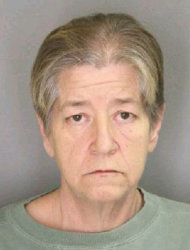 This photo undated provided by the Yates County Sheriff’s Office shows in Penn Yan, N.Y., Kimberly Margeson. Margeson has been charged on Tuesday, Feb. 5, 2013 with criminal sale of a controlled substance and promoting prison contraband for passing Oxycodone pills to her incarcerated son as she kissed him during a visit. (AP Photo/Yates County Sheriff’s Office)