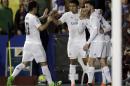 Real Madrid's Cristiano Ronaldo, second right, celebrates with team mates after scoring against Levante during their Spanish La Liga soccer match between Real Madrid and Levante at the Ciutat de Valencia stadium in Valencia, Spain, Wednesday, March 2, 2016. (AP Photo/Alberto Saiz)