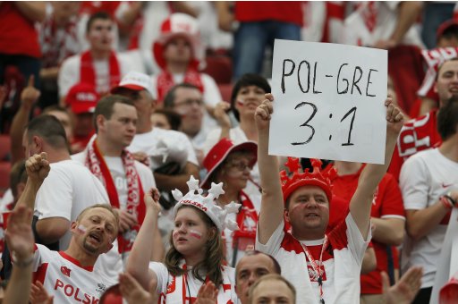 Poland fans cheer ahead of Euro 2012 soccer match between Poland and Greece in Warsaw