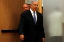 Israeli prime minister Benjamin Netanyahu enters to a media conference together with Israel's new Defence Minister Avigdor Lieberman, head of far-right Yisrael Beitenu party, following Lieberman's swearing-in ceremony at the Knesset, the Israeli parlia