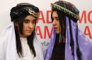 Nadia Murad (R) and Lamia Haji Bashar, public advocates for the Yazidi community in Iraq and survivors of sexual enslavement by jihadists react after being awarded laureates of the 2016 Sakharov human rights prize, on December 13, 2016 in Strasbourg