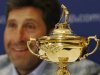 European Ryder Cup captain Jose Maria Olazabal smiles during a news conference in a hotel near Heathrow Airport, in west London