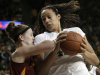 FILE - In this March 3, 2012, file photo, Baylor's Brittney Griner, right, drives against Iowa State guard Lauren Mansfield during an NCAA college basketball game in Waco, Texas. Baylor (34-0), which could become the NCAA's first 40-win team if it win its second national title, opens against Big West Conference tournament champion UC-Santa Barbara (17-15) in the NCAA tournament. (AP Photo/Tony Gutierrez, File)