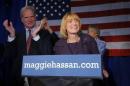 Democratic New Hampshire Governor Maggie Hassan celebrates her re-election with her husband Tom at her side at her election night rally in Manchester