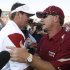 FILE - In this Sept. 11, 2010, file photo, Oklahoma head coach Bob Stoops, left, greets Florida State head coach Jimbo Fisher following an NCAA college football game in Norman, Okla. Fisher believes his coaches and players learned a lot from last year's 47-17 loss to Oklahoma and are ready to challenge the top-ranked Sooners on Saturday, Sept. 17, 2011, on their own field this time. (AP Photo/Sue Ogrocki, File)