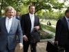 Former Major League Baseball pitcher Roger Clemens, center, leaves federal court, Tuesday, May 1, 2012, in Washington, as his retrial continues on charges of lying to Congress in 2008 when he said he had never used steroids of human growth hormone. (AP Photo/Haraz N. Ghanbari)