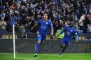 Leicester's Leonardo Ulloa, left, celebrates after scoring against Norwich during the English Premier League soccer match between Leicester City and Norwich City at the King Power Stadium in Leicester, England, Saturday, Feb. 27, 2016. (AP Photo/Rui Vieira)