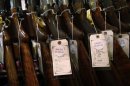 A row of shotguns are seen during the East Coast Fine Arms Show in Stamford, Connecticut