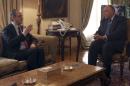 Hadi al-Bahra talks with Sameh Shukri during their meeting in Cairo