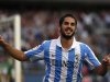 Malaga's Isco celebrates after scoring a goal against Real Betis during their Spanish First Division soccer match at La Rosaleda stadium in Malaga