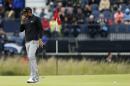 United States' Dustin Johnson reacts on the sixth green during the third round of the British Open Golf Championship at the Old Course, St. Andrews, Scotland, Sunday, July 19, 2015. (AP Photo/Peter Morrison)