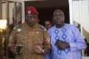 Lieutenant Colonel Yacouba Isaac Zida meets with opposition leader Zephirin Diabre in Ouagadougou, capital of Burkina Faso