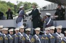 U.S. Vice President Joe Biden hands a diploma to a cadet at West Point during the graduation ceremony for the class of 2012 in New York