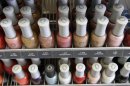Nail care products are displayed at a beauty supply shop in San Francisco, Monday, April 9, 2012. California's chemical regulators randomly sampled dozens of professional grade nail polishes that claimed to be free of a 