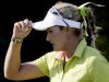 Lexi Thompson tips her cap after making a birdie on the 17th green during the first round of the Navistar LPGA Classic golf tournament, Thursday, Sept. 20, 2012, at the Robert Trent Jones Golf Trail in Prattville, Ala. (AP Photo/Dave Martin)