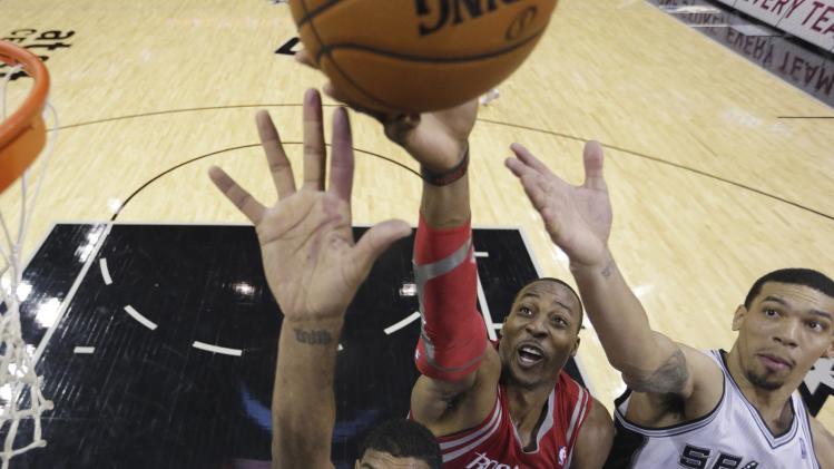 Harden, Howard help Rockets roll past Spurs