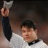 FILE - In this July 10, 1997 file photo, New York Yankees' Hideki Irabu tips his cap to the crowd after he was taken out of the game in the sixth inning against the Detroit Tigers in New York. Irabu has been found dead at a home in a wealthy Los Angeles suburb of an apparent suicide, Los Angeles County sheriff's Sgt. Mike Arriaga said Thursday, July 28, 2011.  (AP Photo/John Dunn, File)