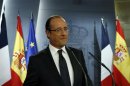 French President Hollande looks on at the start of a news conference in Madrid