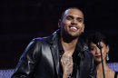 In this Feb. 12, 2012 photo, Chris Brown accepts the award for best R&B album for 