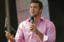 New York Jets quarterback Tim Tebow speaks at the Easter service of Celebration Church in Georgetown, Texas, Sunday, April 8, 2012. (AP Photo/William Philpott)