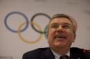 International Olympic Committee President Thomas Bach smiles during a press conference in Rio de Janeiro, Brazil, Saturday, Feb. 28, 2015. IOC officials have been in Rio this week monitoring progress on the games. South America's first Olympics open Aug. 5. 2016. (AP Photo/Silvia Izquierdo)
