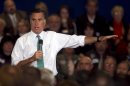 FILE - In this April 11, 2012, file photo, Republican presidential candidate, former Massachusetts Gov. Mitt Romney, speaks to a crowd during a campaign event, in Warwick, R.I. Romney wants the United States to get much tougher with Iran and end what a top adviser calls the 