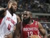 Houston Rockets guard James Harden (13) drives to the basket against Detroit Pistons center Greg Monroe (10) duringg the first half of an NBA basketball game Wednesday, Oct. 31, 2012, in Detroit. (AP Photo/Duane Burleson