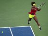 Williams of the U.S. hits a return to Errani of Italy during their women's semifinals match at the U.S. Open tennis tournament in New York